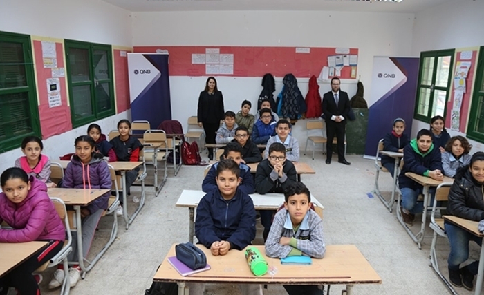 منوبة :QNB تونسيزورالمدرسة الابتدائية أبو القاسم الشابي تحت عنوان "المال والاقتصاد بطريقة مبسطة "